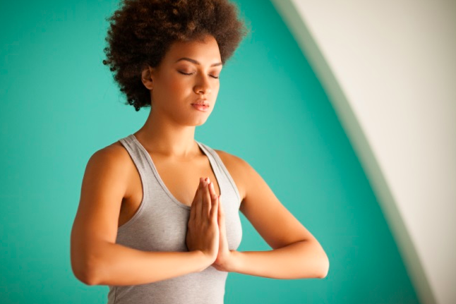 Meditation young woman of color.png